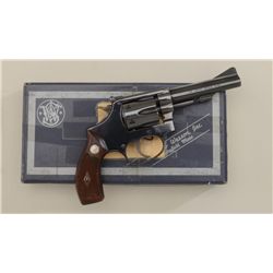 Smith & Wesson Model 34-1 DA revolver, .22LR  cal., 4” barrel, blue finish, flat latch,  checkered w