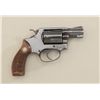 Image 1 : Smith & Wesson Model 36 (no dash) DA  revolver, .38 Special cal., 2” barrel, blue  finish, checkered