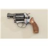 Image 2 : Smith & Wesson Model 36 (no dash) DA  revolver, .38 Special cal., 2” barrel, blue  finish, checkered