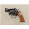 Image 3 : Smith & Wesson Model 15-4 DA revolver, .38  Special cal., 2” barrel, blue finish,  checkered wood me