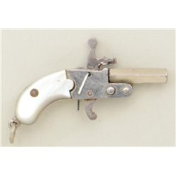 Miniature single shot derringer approx.  1-3/4” overall, nickel finish, pearl grips;  hammer pin nee