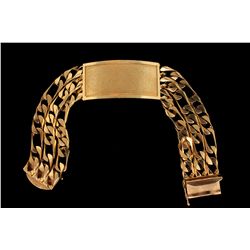 BRACELET: 14KYG ID style bracelet with triple Figaro chains