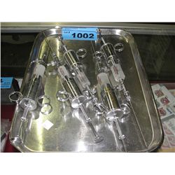 Silver veterinarians tray and 5 large syringes