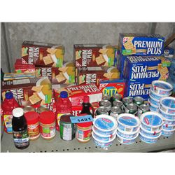 Shelf lot of snack foods and assorted canned goods