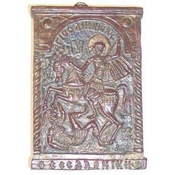 AN EARLY CONTINENTAL CARVED WOOD ICON in f...