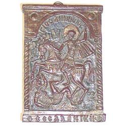 AN EARLY CONTINENTAL CARVED WOOD ICON in f...