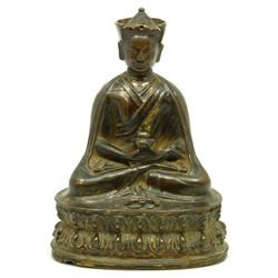 16th CENTURY TIBETAN GILT BRONZE OF A LAMA