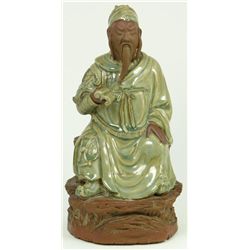 18th CENTURY CHINESE CELADON GLAZE SEATED FIGURE