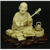 Image 1 : JAPANESE CARVED IVORY STUDY OF SEATED MUSICIAN