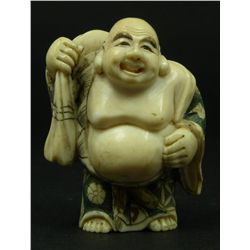 JAPANESE CARVED IVORY NETSUKE OF THREE MEN