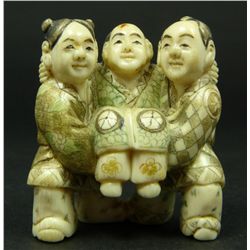 JAPANESE CARVED IVORY NETSUKE OF THREE MEN