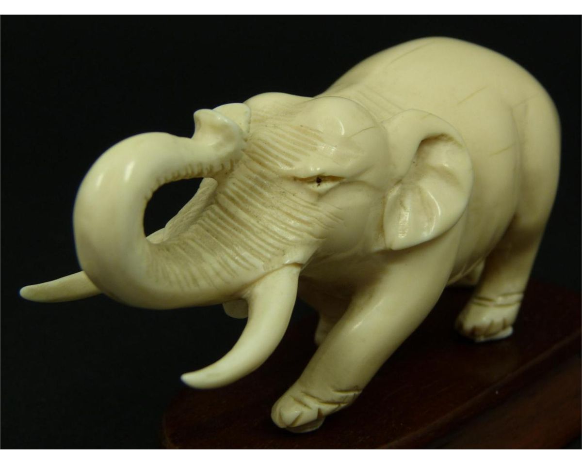 ANTIQUE HAND CARVED IVORY ELEPHANT