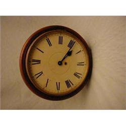 A 19th Century mahogany circular case wall ti