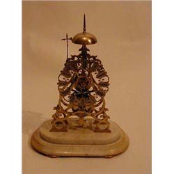 A 19th Century skeleton clock the single trai