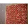 An Agra carpet the deep red ground with an al