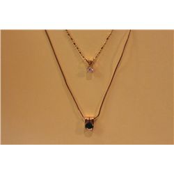 ONE 14KT YELLOW GOLD DIAMOND SOLITAIRE PENDANT &