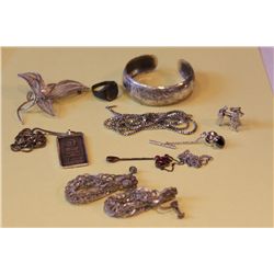 A COLLECTION OF NINE STERLING SILVER & SILVER