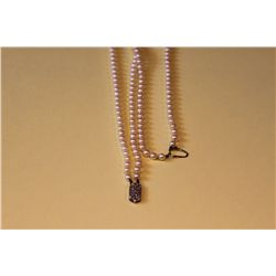 ONE DOUBLE STRAND OF ROUND WHITE AKOYA CULTURED