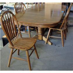 Double pedastol oak dining table with 2 leafs and