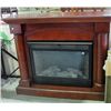 Image 1 : Mahogany finish fireplace mantel with electric