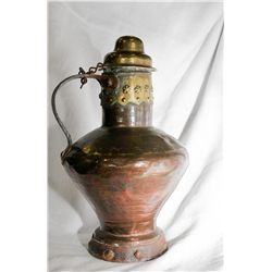 Early copper and brass dove tailed vessel
