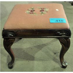 Antique footstool with petite point cushion