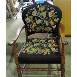 Antique maple petite point upholstered arm chair