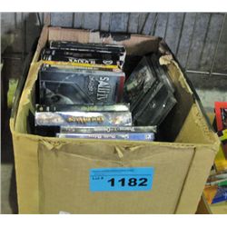 Box of assorted DVD movies and PS2 games