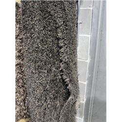Brown shag area rug