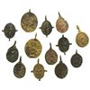 Image 1 : Lot of 13 small, brass religious medallions.