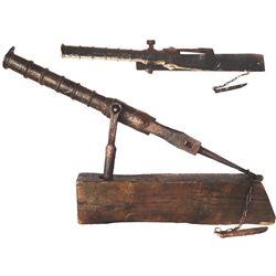 Iron breech-loading swivel cannon (rare), English, 1500s-1600s, with wooden block mount.