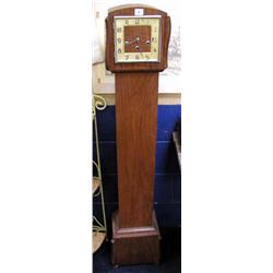 A Walnut cased, Westminster chime Granddaught...