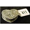 Image 1 : A Silver heart shaped box embossed cherub fig...