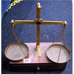 A set of precision weighing scales (jewellers...