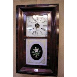 An American wall clock with floral painted pa...