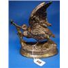 Image 1 : A Spelter figure of a bird, signed Comolbra....