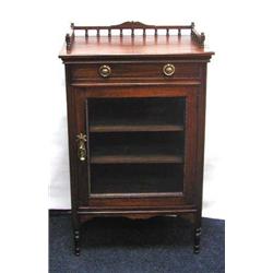 A Victorian Mahogany, glazed door cabinet wit...