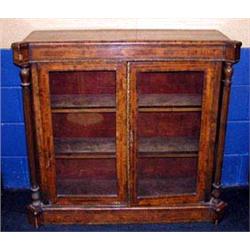 A Regency burr Walnut, floor standing bookcas...