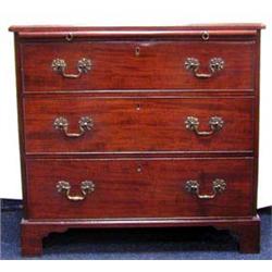A superb George II, Mahogany chest of three l...