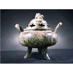 Chinese, bronze tripod censer with lion finia
