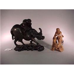 Two old, Chinese wood carvings: hardwood boy