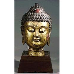 Chinese, gilt-iron head of Buddha with well-d