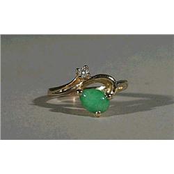 14K yellow gold ring, set with a pear-shaped