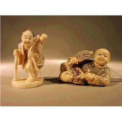 Two well-carved and lightly polychrome scrimm