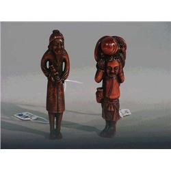 Two tall, carved wood netsuke: standing beard