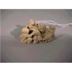 Well-carved and antique, ivory netsuke of a s
