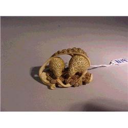 Finely carved, highly detailed and lightly st