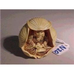 Finely carved, highly detailed and lightly po
