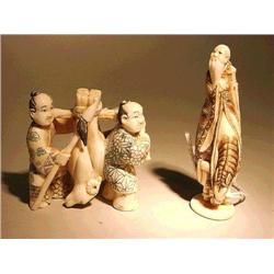 Two carved and lightly polychromed ivory nets
