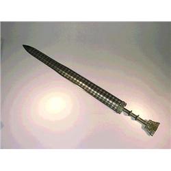 Very finely cast and beautifully inlaid, Chin